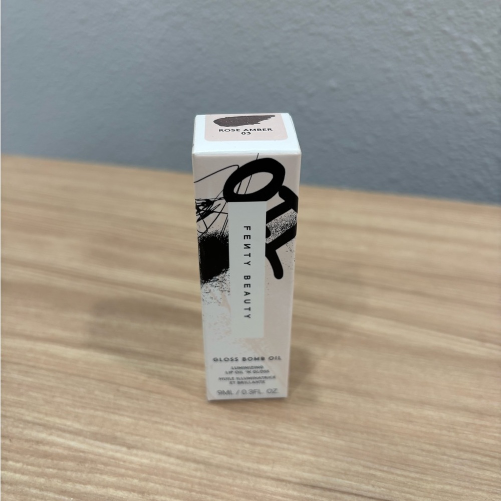Fenty Beauty Gloss Bomb Oil in color Rose Amber 03 never opened $14. NWT
